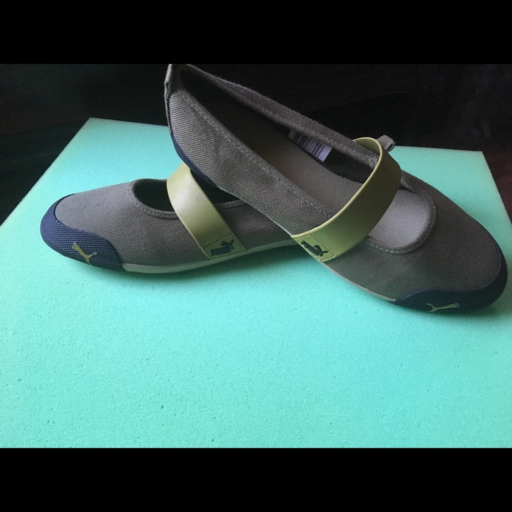 Puma flats or slip on shoes